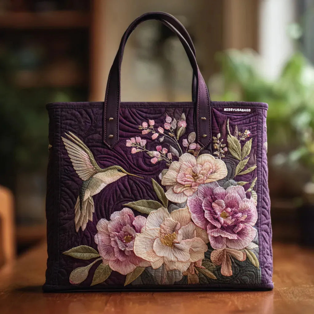Bolsa acolchado morado con colibríes y orquídeas