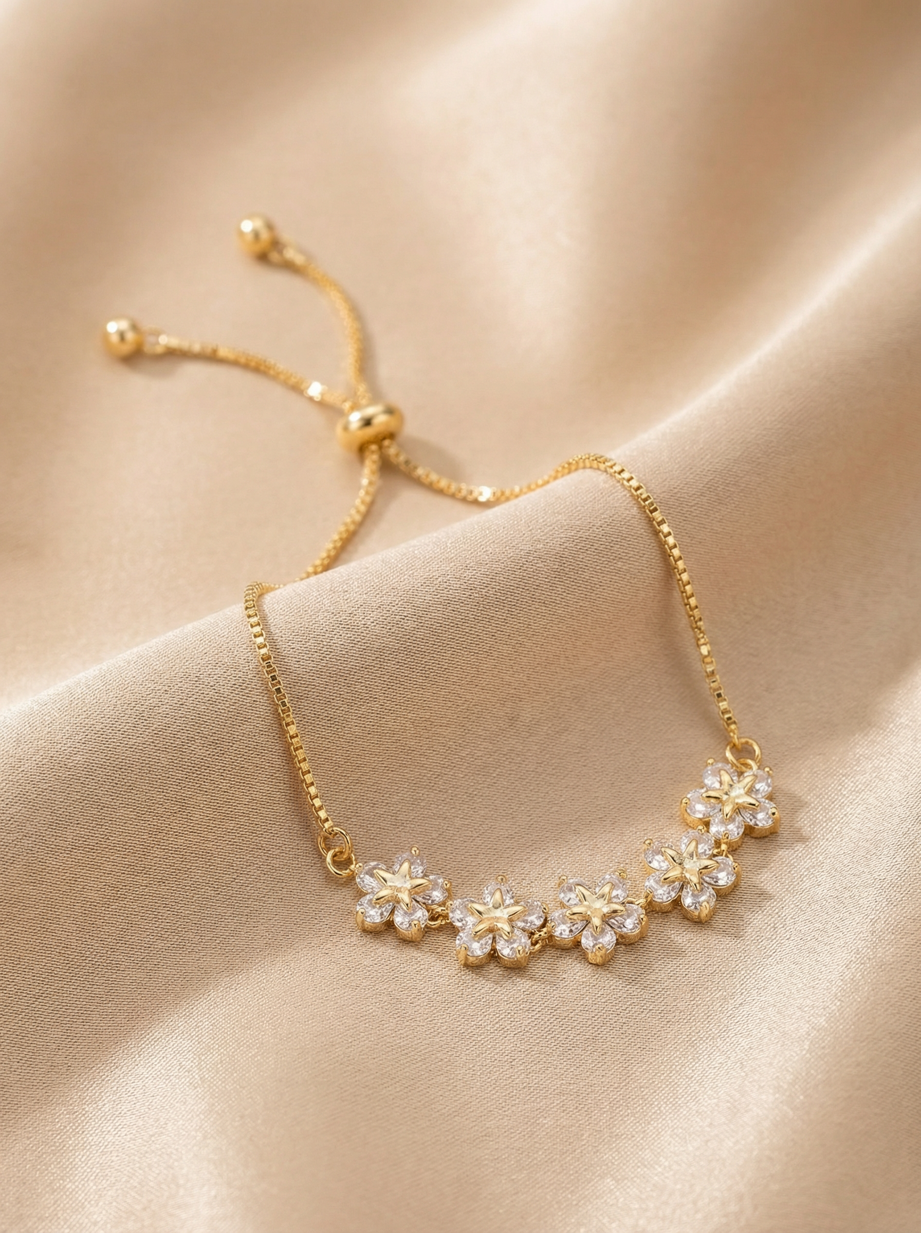 PULSERA MARGARITA DE CRISTAL EN ORO